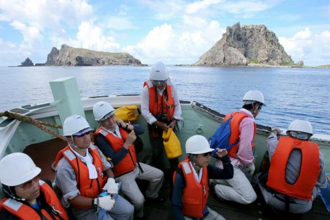 A team of Japanese surveyors sail near a disputed island chain. Photo: AFP