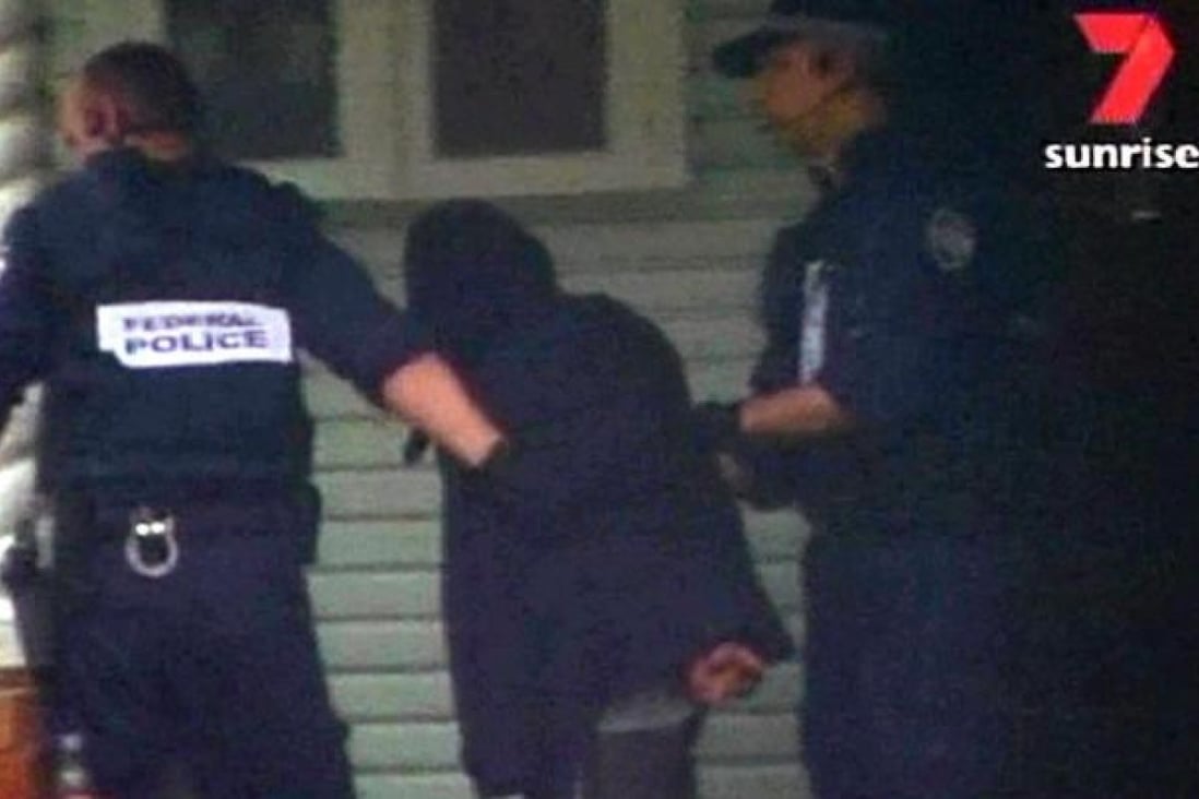 Video grab of man arrested in Sydney. Photo: Reuters