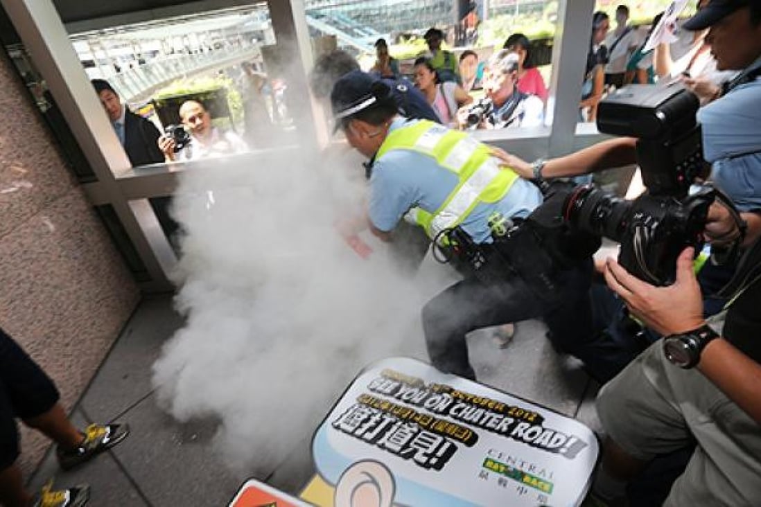 A protest against Japan's proposed purchase of the Diaoyu islands gets out of hand at Exchange Square in Central, Hong Kong, on Wednesday. Photo: David Wong