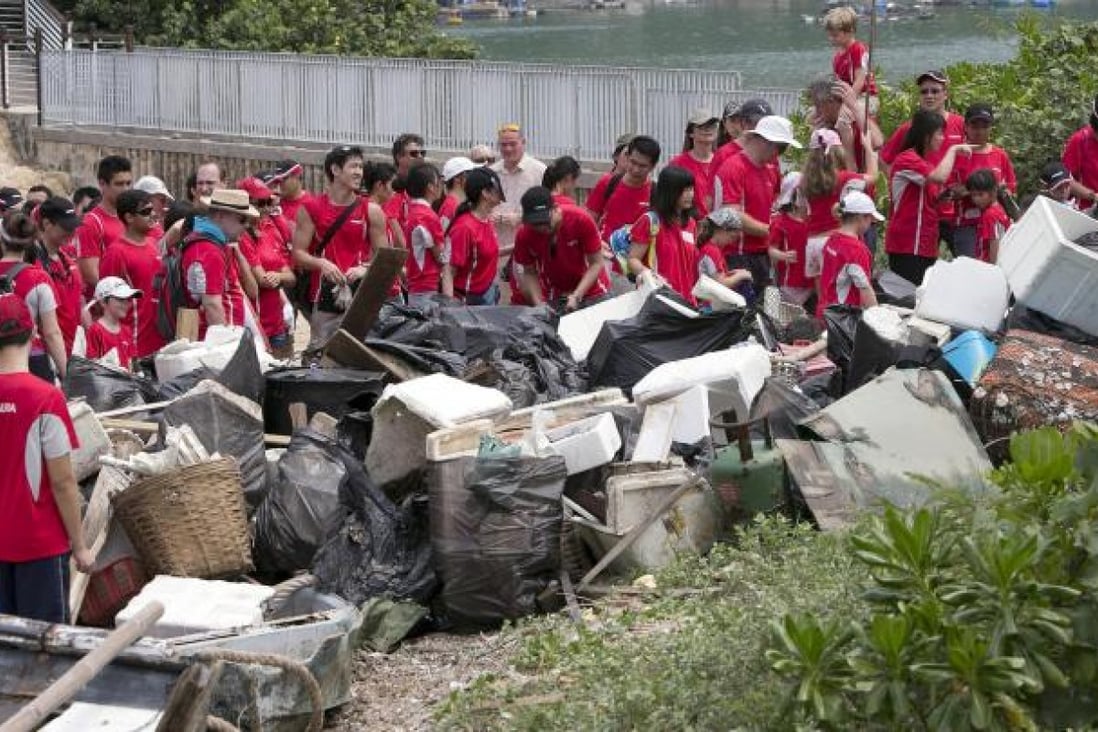 The 200 volunteers from Nomura bank and Ecovision Asia collected over 200 bags of trash on Lamma Island. Photo: David Wong