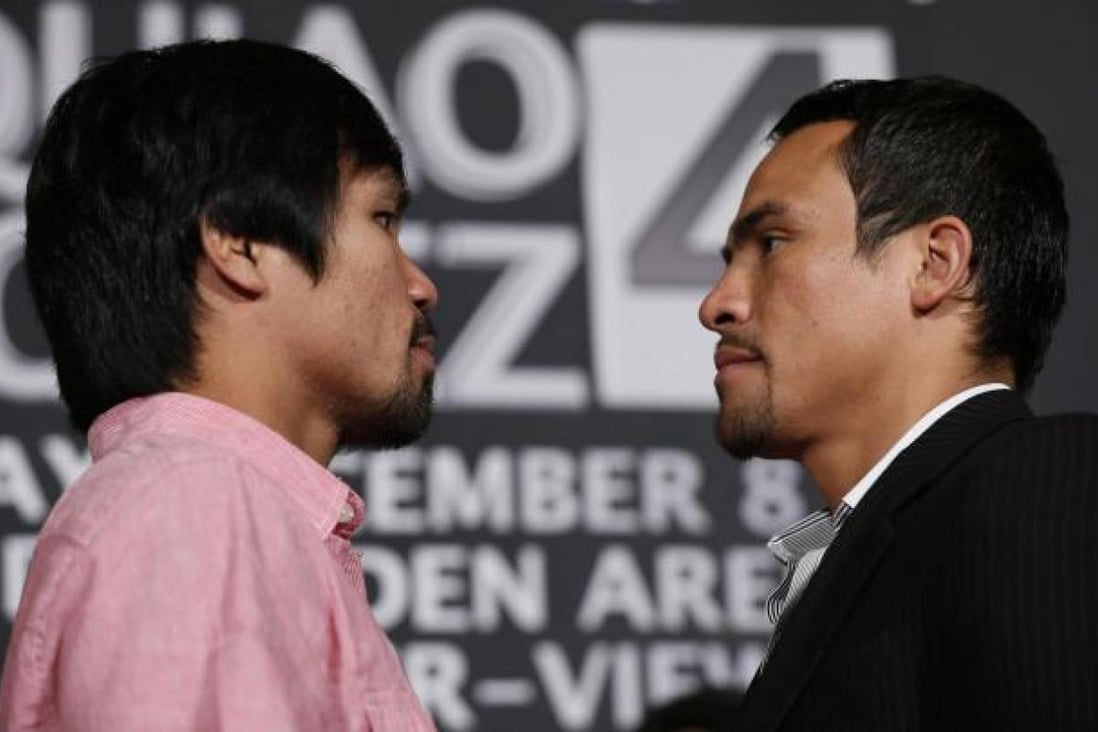 Pacquiao and Marquez promote their bout. Photo: Reuters