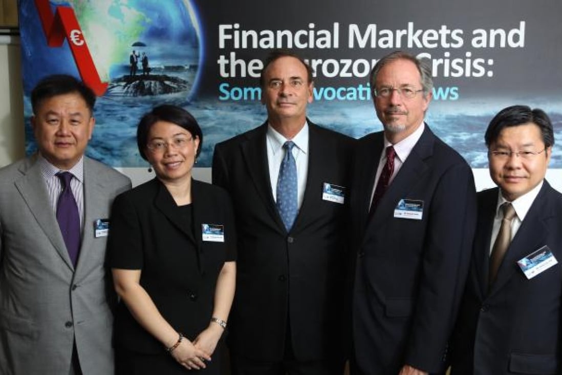Seminar participants included (from left) Water Cheung of StormHarbour Securities, Wendy Guo of the CFA Institute, Bruno Solnik of HKUST's Finance Department, Kenneth Howe of SCMP Publishers, and HKSFA's Jimmy Jim. Photo: Dickson Lee