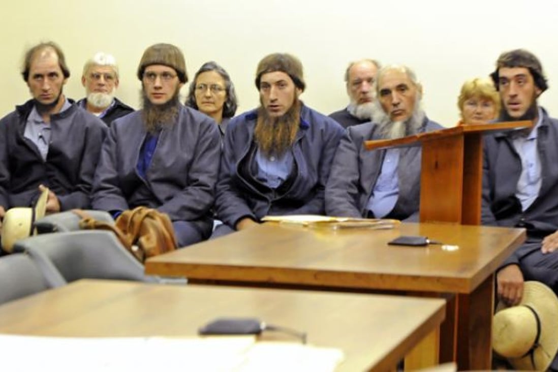 Five of Samuel Mullet Snr's followers appear in an Ohio court last year accused of hate crimes. Photo: AP