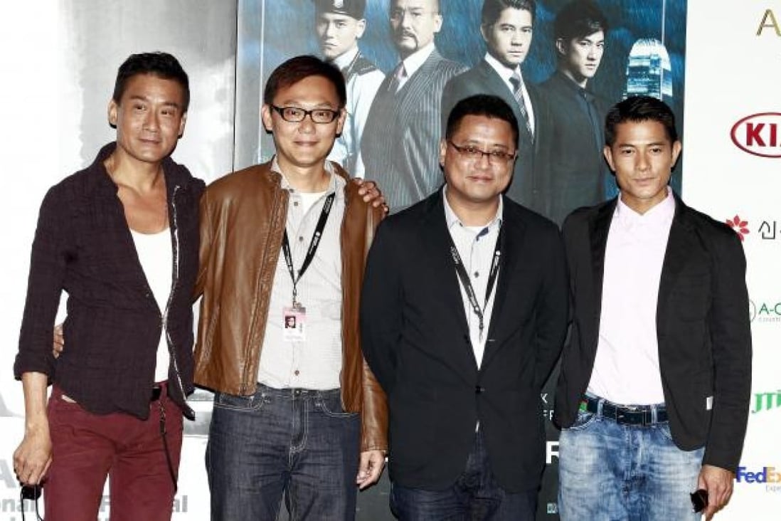The Hong Kong film <i>Cold War</i> will launch the Busan Asian Film Festival. Left to right, the film's star actor Tony Leung Ka-Fai, co-directors Sunny Luk and Longman Leung, and actor Aaron Kwok pose for photographs after a press conference in Busan, South Korea, on Thursday. Photo: EPA