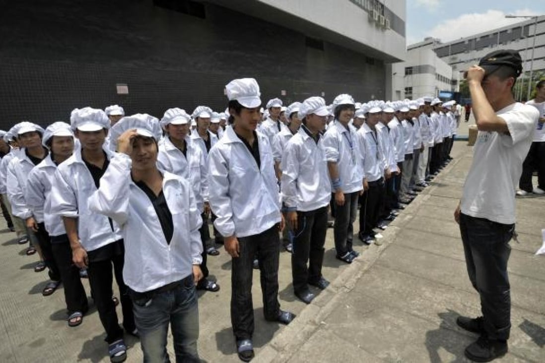 Workers at a Foxconn factory in Shenzhen. Photo: AFP