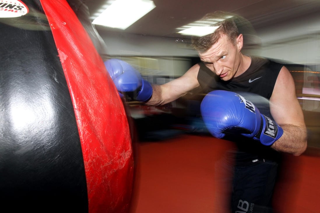 Bankers ride the punches for charity South China Morning Post