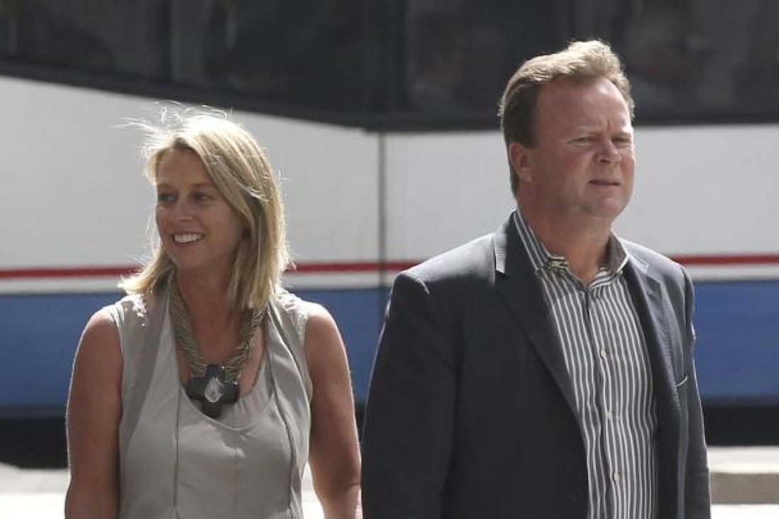 Belinda and Bill Pulver, parents of the collar bomb hoax victim, Madeleine, arrive at the court in Sydney yesterday. Photo: AP