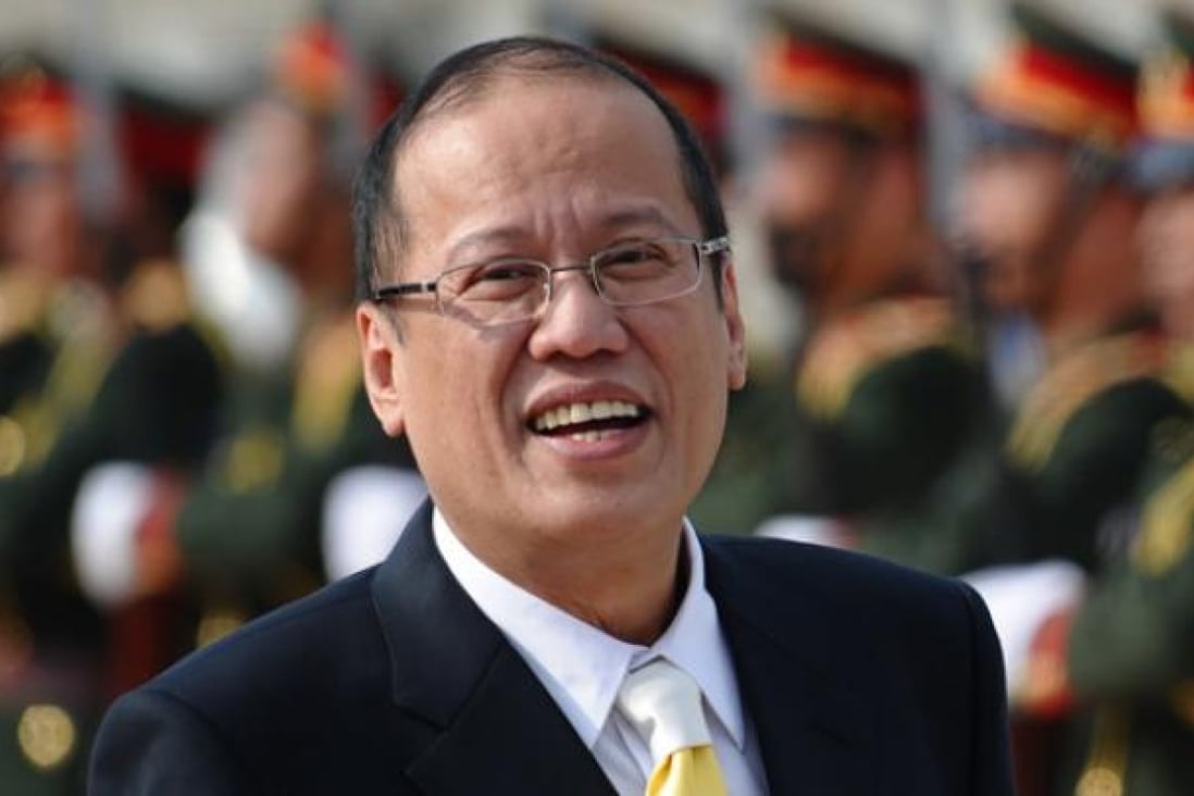 Philippines' President Benigno Aquino smiles upon his arrival at Wattay airport to attend the ninth Asia- Europe summit in Vientiane on Sunbday. Photo: AFP