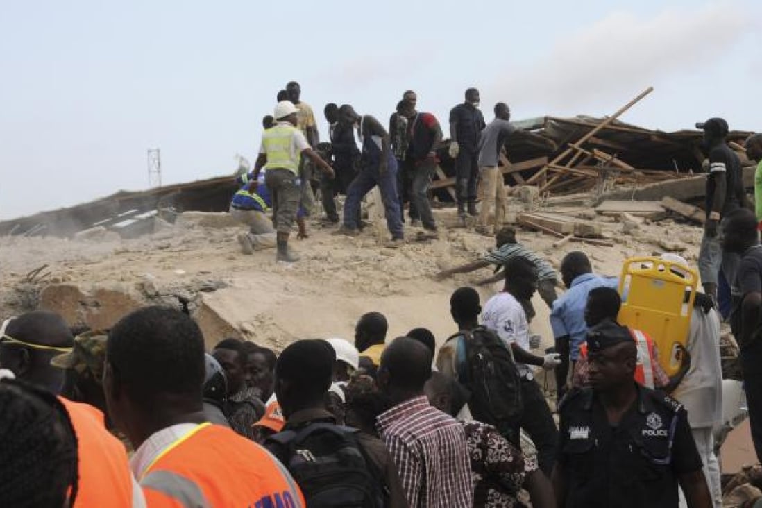 Rescue workers at the site of a building collapse in Accra, Ghana, early Wednesday. Photo: Xinhua