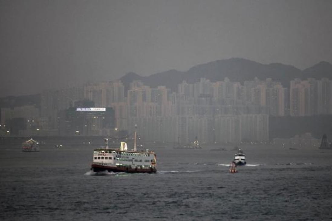 Hong Kong's famous skyline is obscured by haze. Photo: AFP