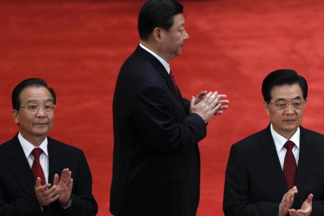 Xi Jinping (centre) is flanked by Wen Jiabao and Hu Jintao, who failed to install allies in several key positions. Photo: AP