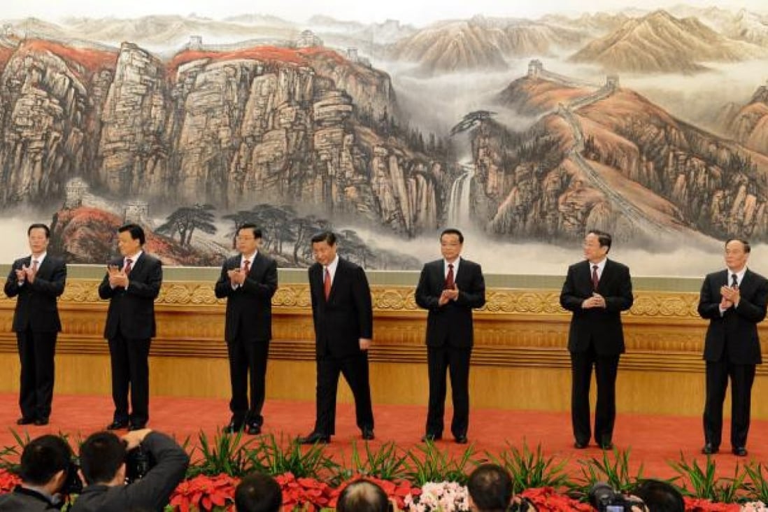 The new Politburo Standing Committee members (from left) Zhang Gaoli, Liu Yunshan, Zhang Dejiang, Xi Jinping, Li Keqiang, Yu Zhengsheng and Wang Qishan in the Great Hall of the People. Photo: AFP