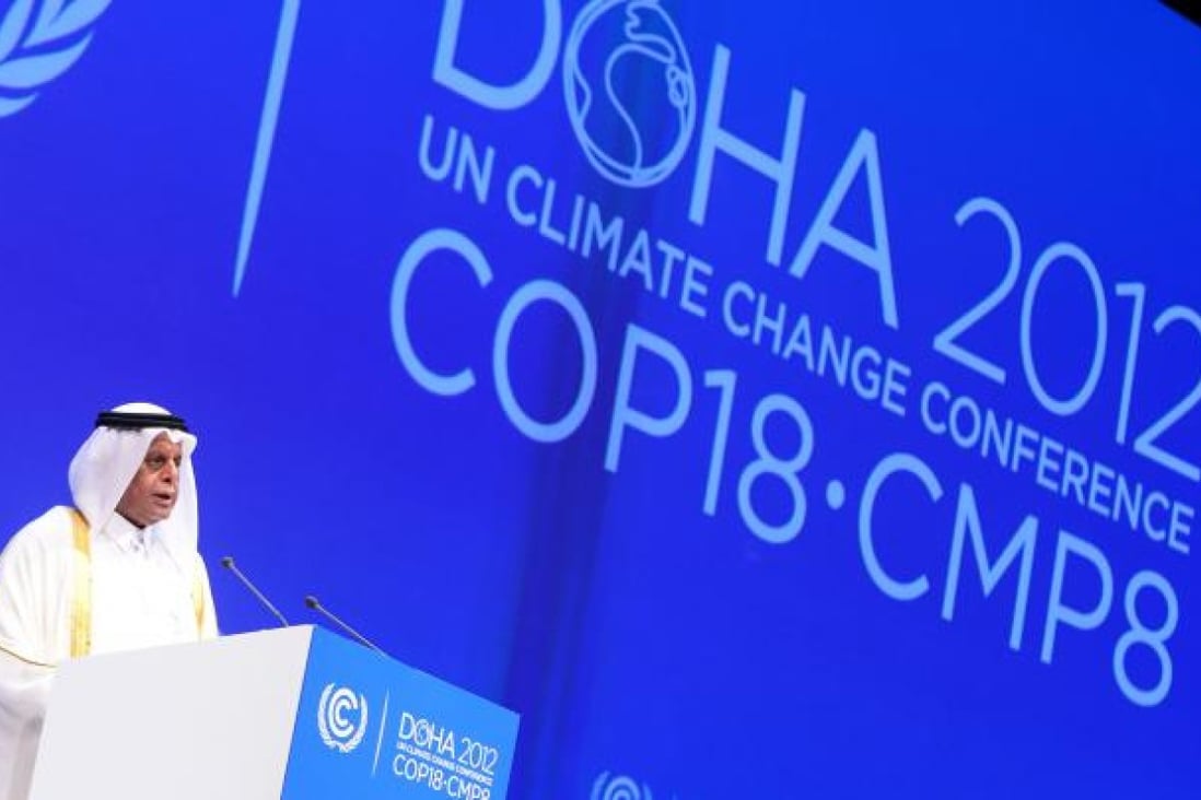 Qatar's deputy Prime minister and 18th Conference of the Parties (COP18) president Abdullah bin Hamad Al-Attiyah delivers a speech. Photo: EPA