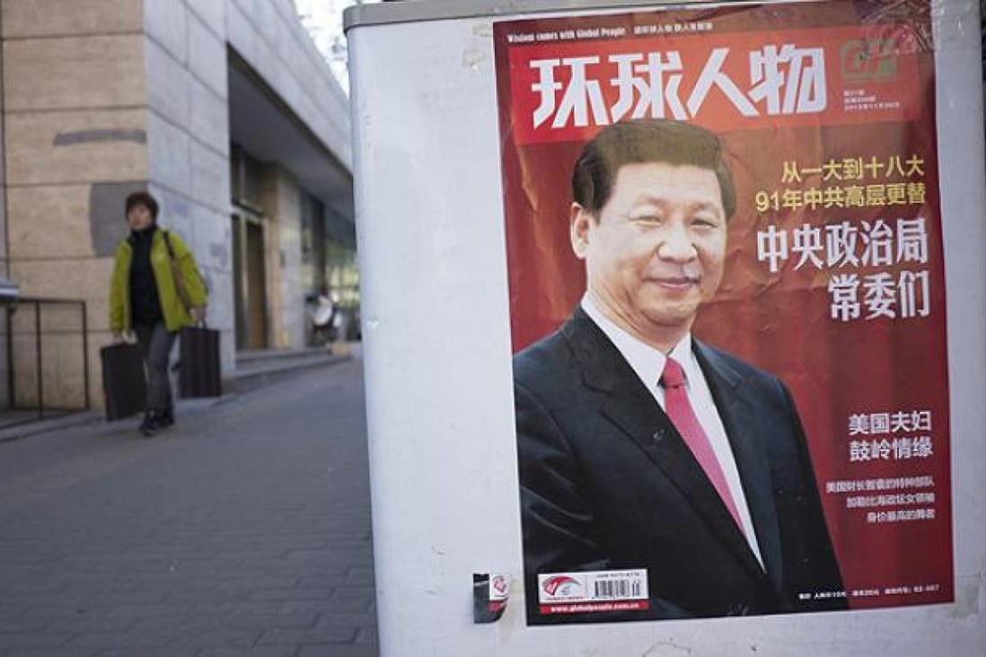 Xi Jinping graces the cover of a news magazine in central Beijing. Photo: EPA