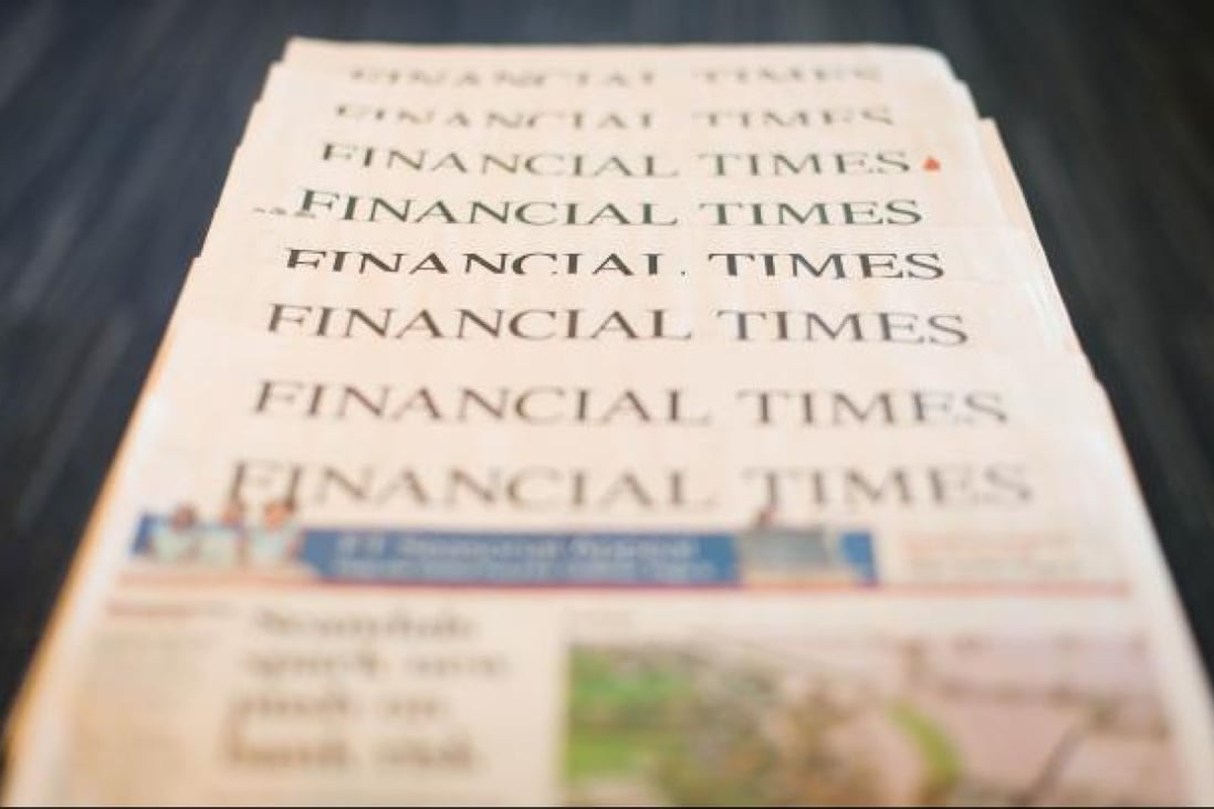 This illustrative picture taken in London on December 11, 2012 shows copies of the Financial Times newspaper. Photo: AFP