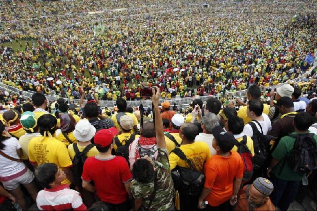 Tens of thousands attend an opposition rally at Kuala Lumpur's Stadium Merdeka, where independence was declared in 1957. Photo: Reuters