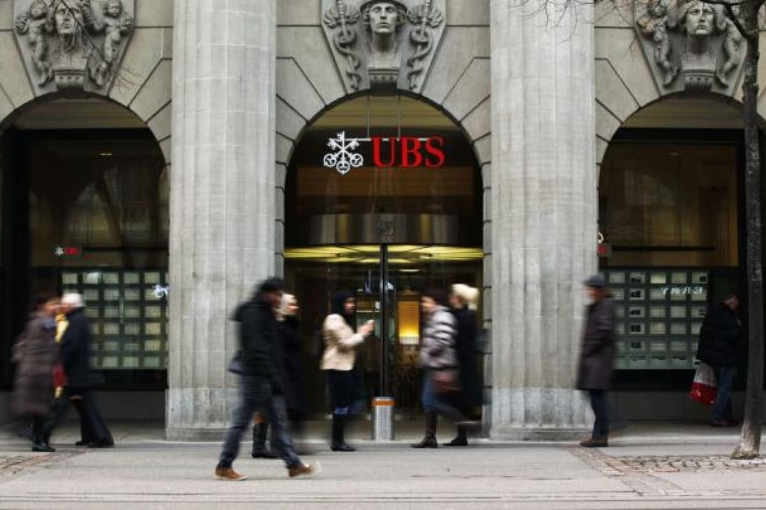 UBS fined over AIG investment fund risks. Photo: Reuters