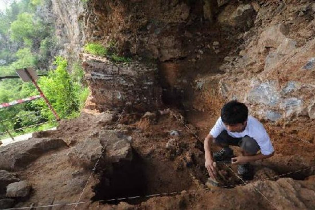 An archaeologist explores the Zhoukoudian Caves in Beijing, which have yielded Peking Man and Tianyuan Man. Photo: SMP