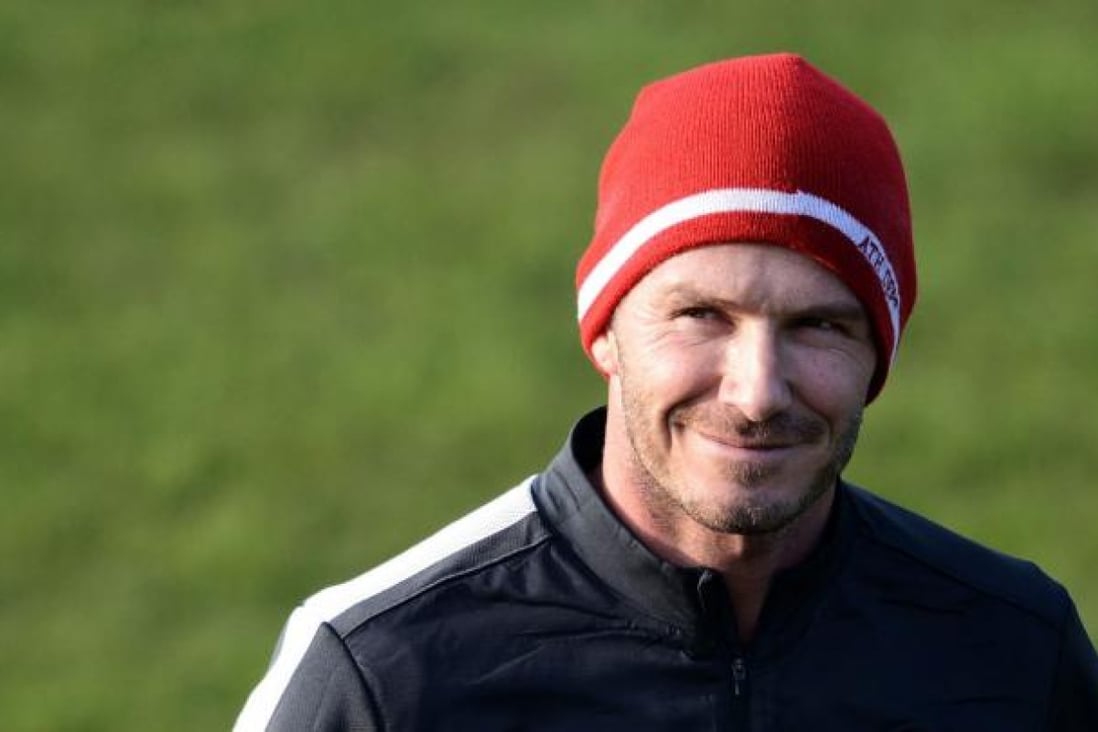 Fans doubt David Beckham can help clean up the tainted Chinese Super League. Photo: AFP
