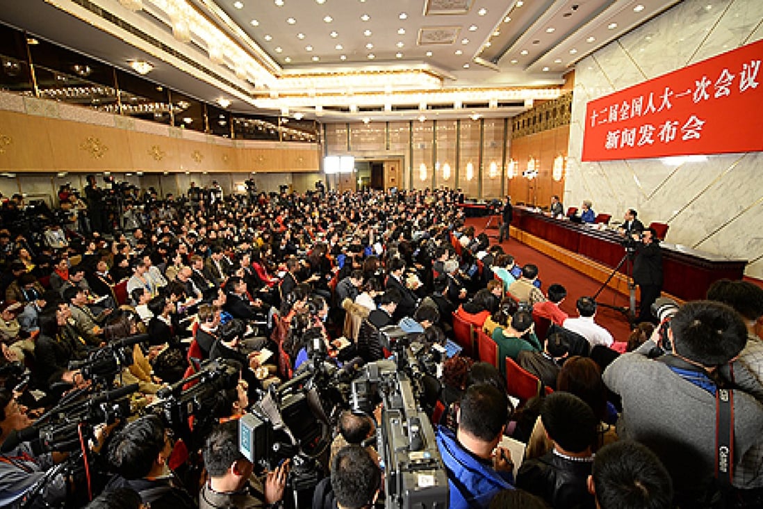 A press conference kicks off the annual legislative meeting in Beijing. Photo: Xinhua