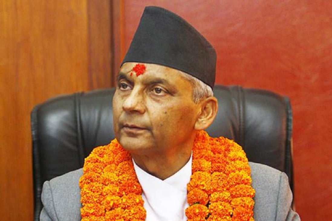 Nepal's newly-appointed Prime Minister Khilraj Regmi assumes office after being sworn in in Katmandu, Nepal, on Thursday. Photo: AP