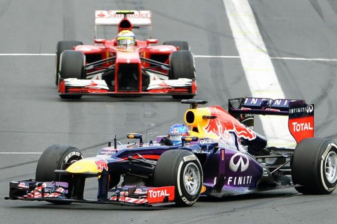 Red Bull driver Sebastian Vettel leads Ferrari's Felipe Massa during the Formula One Australian Grand Prix in Melbourne. Photo: AFP