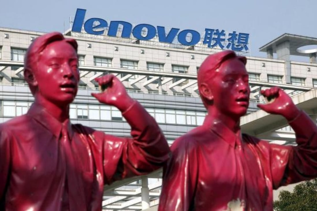 A Lenovo logo seen behind a sculpture at the company's office in Shanghai on 15 January, 2009. (Photo: EPA)