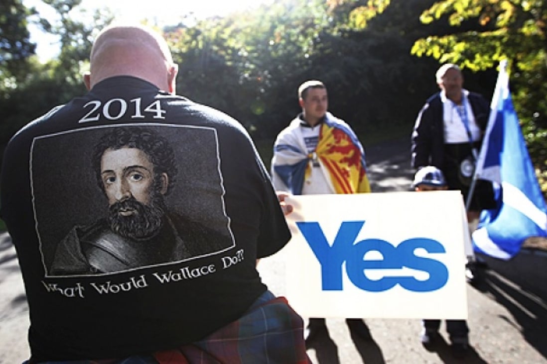 Pro-independence supporters take part in a rally in Princes Street gardens in Edinburgh. Photo: Reuters
