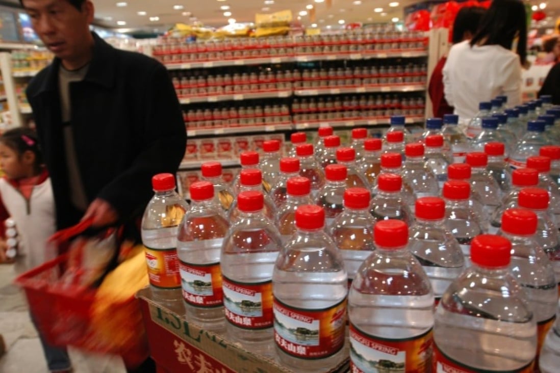 Nongfu Spring water is sold in Beijing. The brand saw its sales of bottled water drop after a newspaper investigated its quality standards. Photo: Ricky Wong