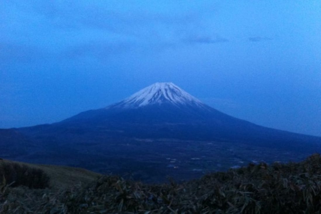 The UTMF course was a loop around Mount Fuji, seen here at dusk at Ryugatake (1,485m) about 26km into the 100-mile race. Photo: Jeanette Wang