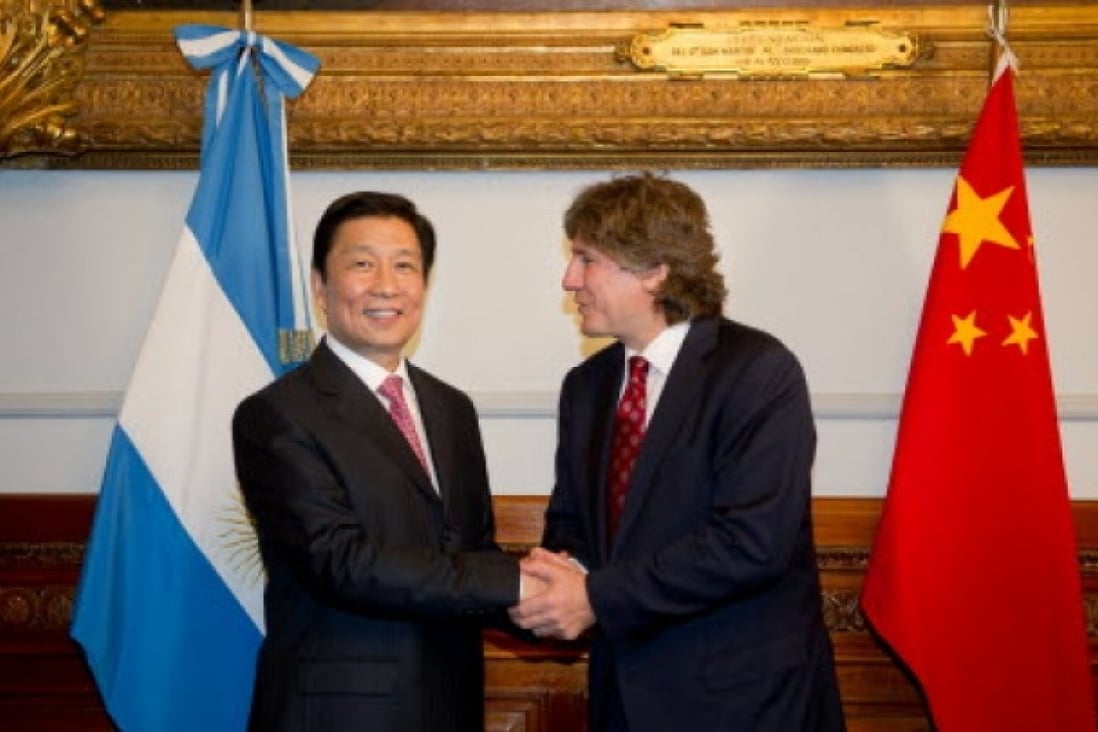 Argentine Vice President and President of the Senate Amado Boudou (R) meets with visiting Chinese Vice President Li Yuanchao in Buenos Aires. Photo: Xinhua