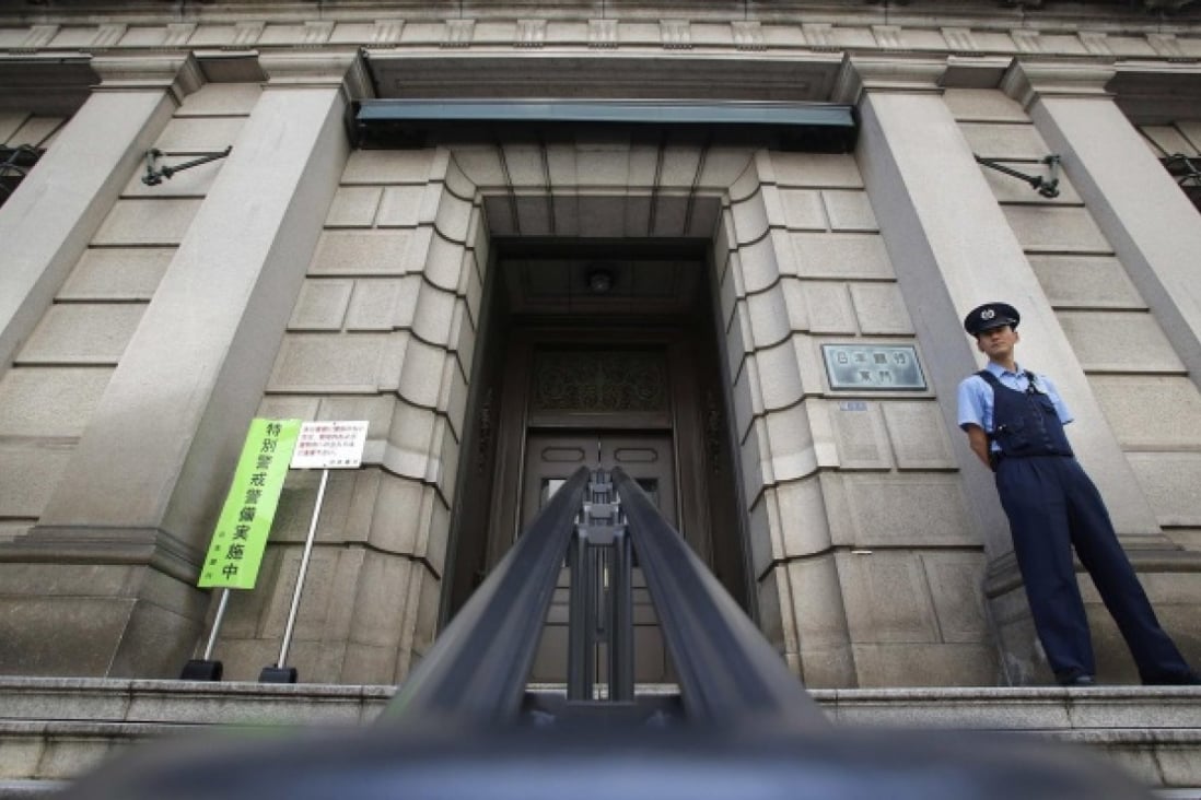 The Bank of Japan building in Tokyo. Signs show a rift among the nine-member board. Photo: Reuters