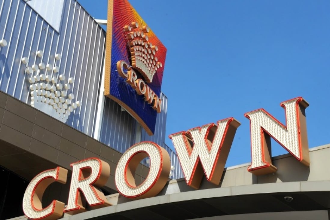 Crown Casino signs displayed on the side of the casino in Melbourne. Photo: AFP