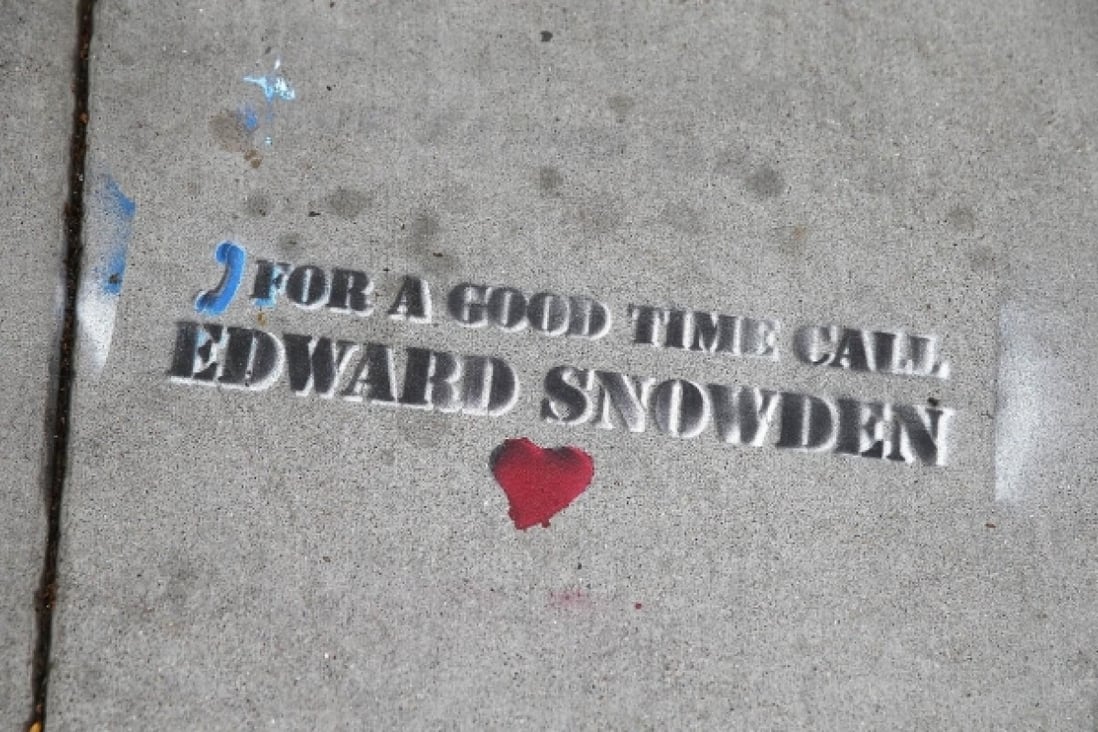 Graffiti supportive of whistle-blower Edward Snowden makes a statement on a pavement in San Francisco. Photo: AFP