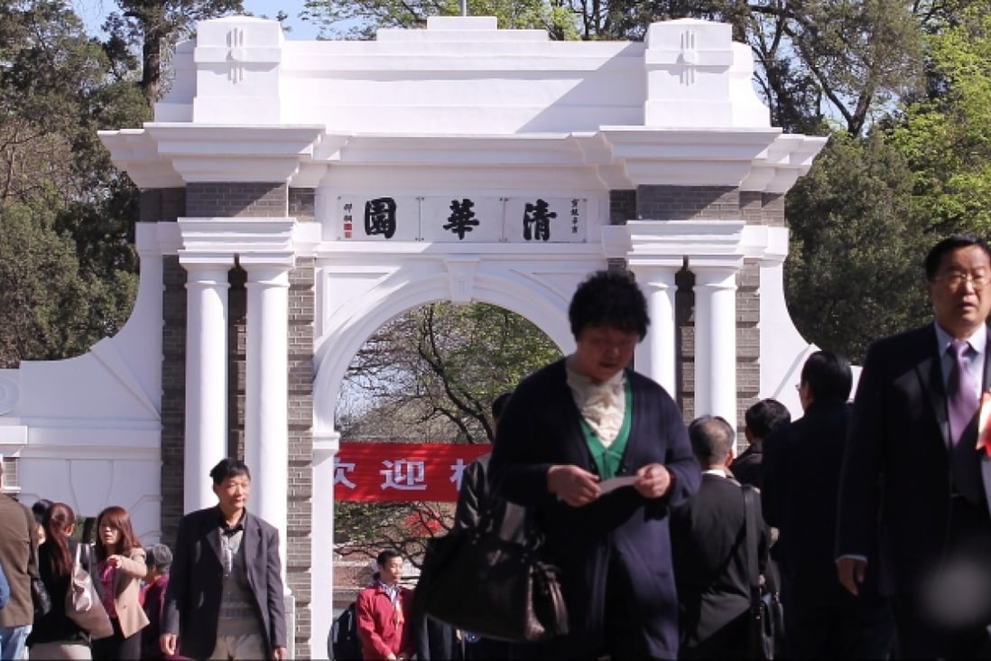 People walk in front of a historic gate in Tsinghua University, target of hacking by the US National Security Agency. Photo: SCMP/Simon Song