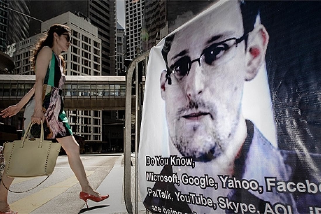 A banner displayed in support of Edward Snowden in Central. Photo: AFP