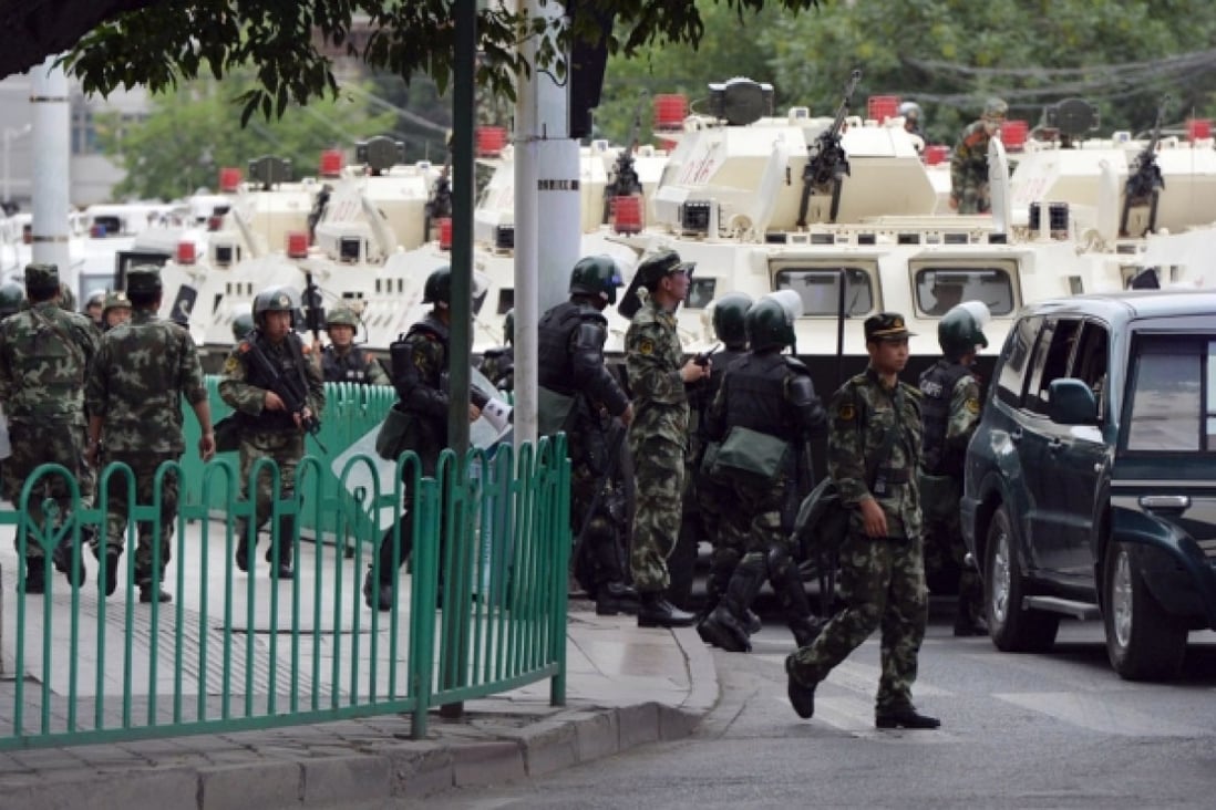Xinjiang beefed up army force after the latest riot. Photo: AFP