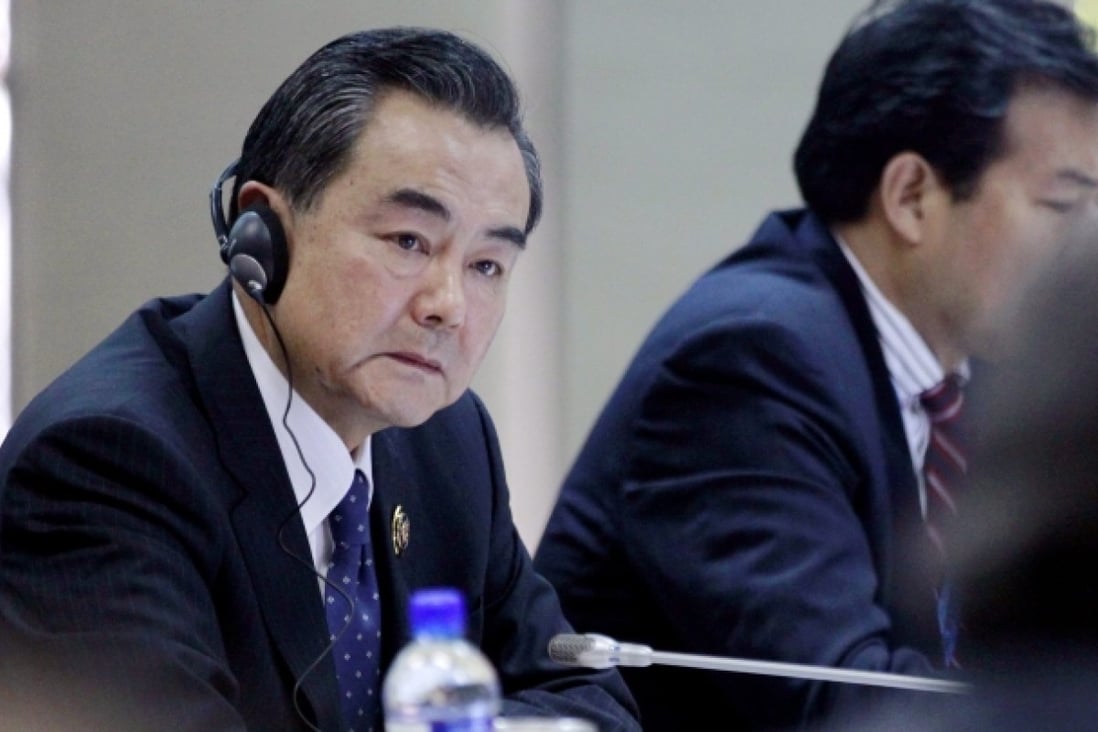 China's Foreign Minister Wang Yi in the ASEAN - China Ministerial meeting. Photo: EPA