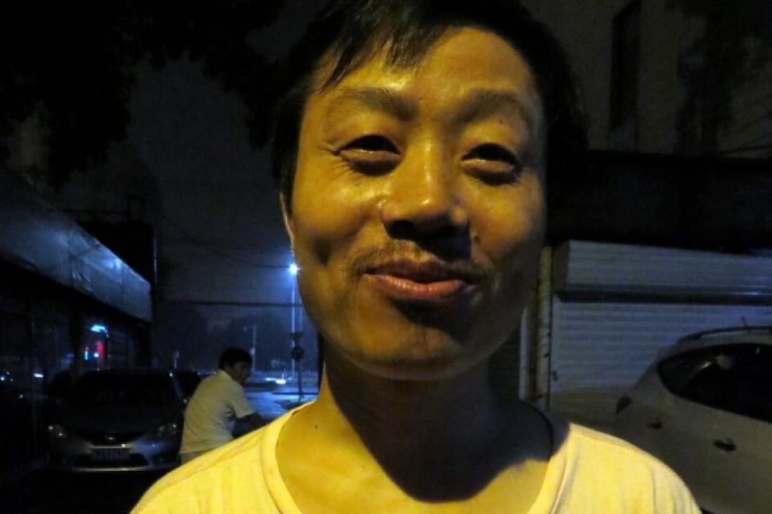 Photo, from activist Hu Jia, of filmmaker Du Bin after his release on bail on Monday night. Photo: SCMP Pictures  