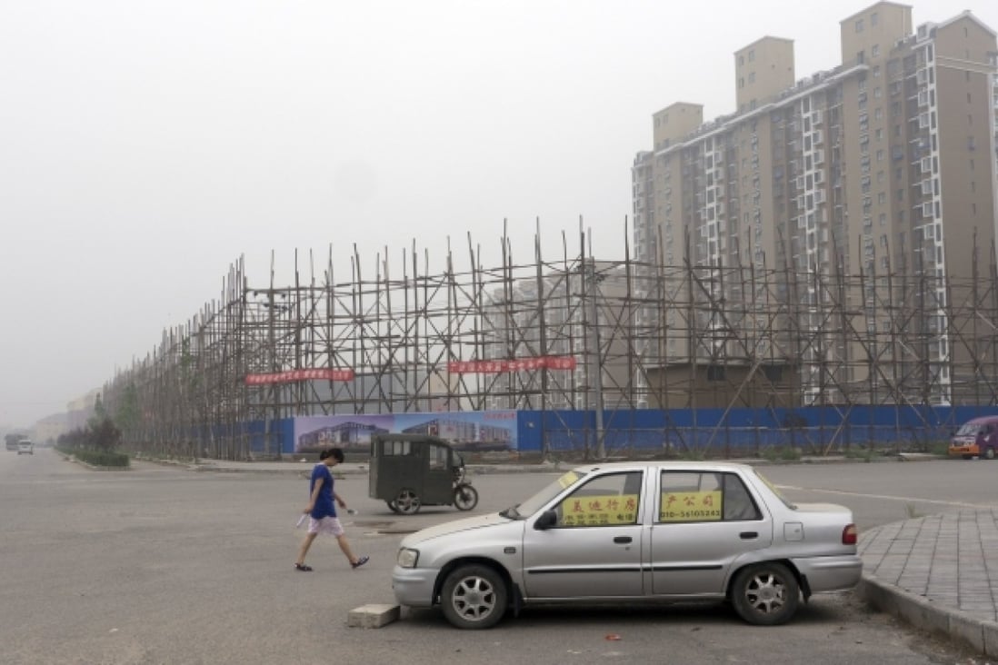 While China is world's largest construction market and cities expand rapidly, the supply of social housing could become a major problem. Photo: EPA