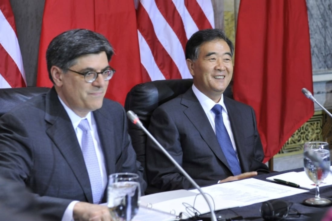 Funny? US Treasury Secretary Jacob Lew (left) and Chinese Vice-Premier Wang Yang attend the opening session of economic talks in Washington. Photo: Xinhua
