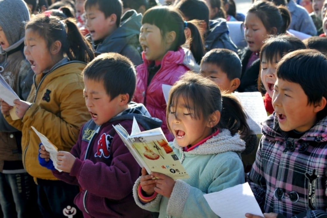 Students have a morning reading at the school in Gaojie Village, Shaanxi Province on Nov. 28, 2012. Photo: Xinhua
