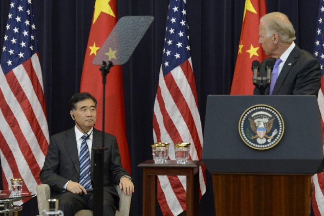 Vice Premier of China Wang Yang (left) listens to US Vice President Joe Biden deliver remarks during China Strategic and Economic Dialogue. Photo: EPA