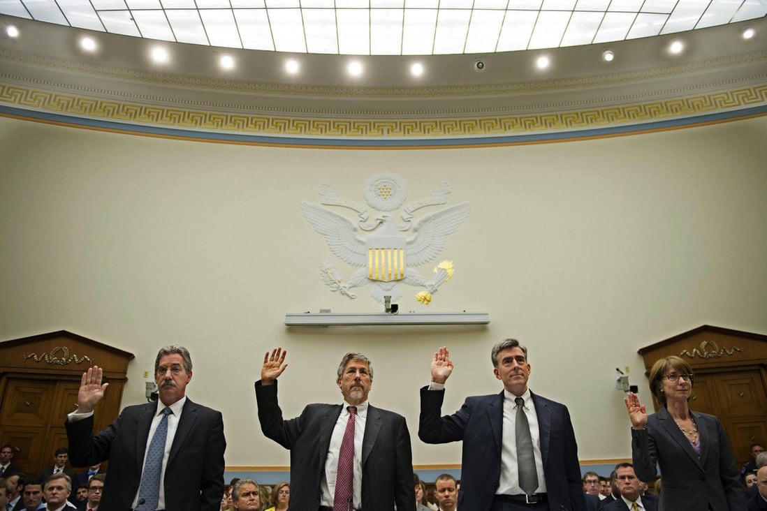 Deputy Attorney General James Cole (left), National Intelligence Director Robert Litt, National Security Agency Deputy Director, John Inglis, and Stephanie Douglas of the FBI are sworn in for the hearing.Photo: AFP
