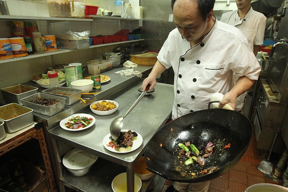 A chef at the Wan Chai mosque cooks halal food during Ramadan. Photo: K.Y. Cheng 