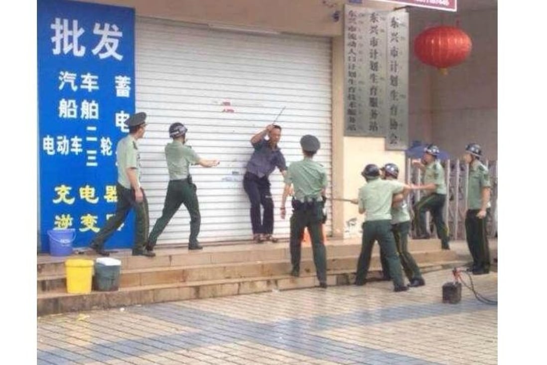 A screen grab of an online video clip that records the attacker's arrest. Photo: SCMP Pictures