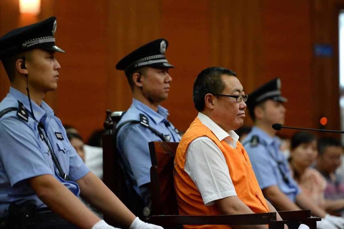 Yang Dacai, a former work safety official exposed by internet users, appears at Xian Intermediate People's Court yesterday. Photo: Xinhua