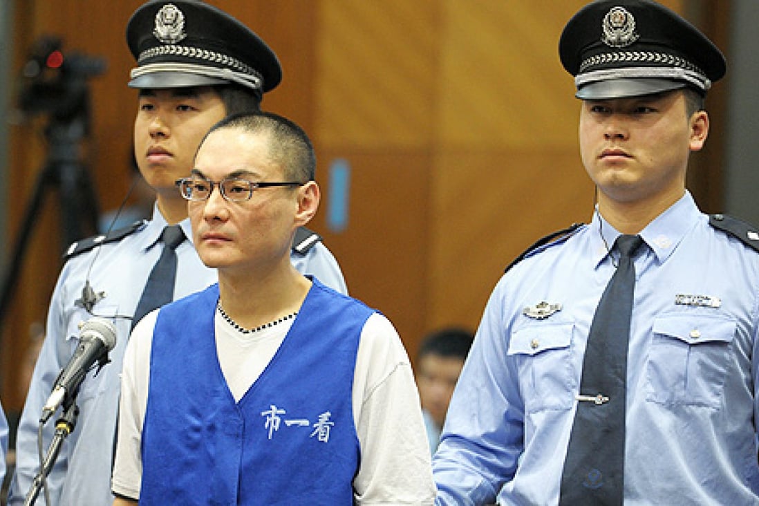 Han Lei stands trial at the Beijing No 1 Intermediate People's Court in Beijing on Wednesday. Photo: Xinhua