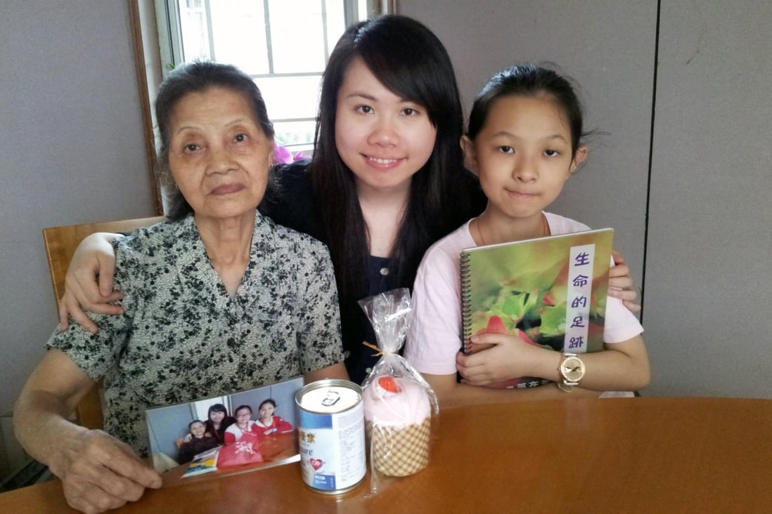 Grace Huang (centre), one of the mentors who visits elderly people and helps children with their homework. Photo: SCMP Pictures