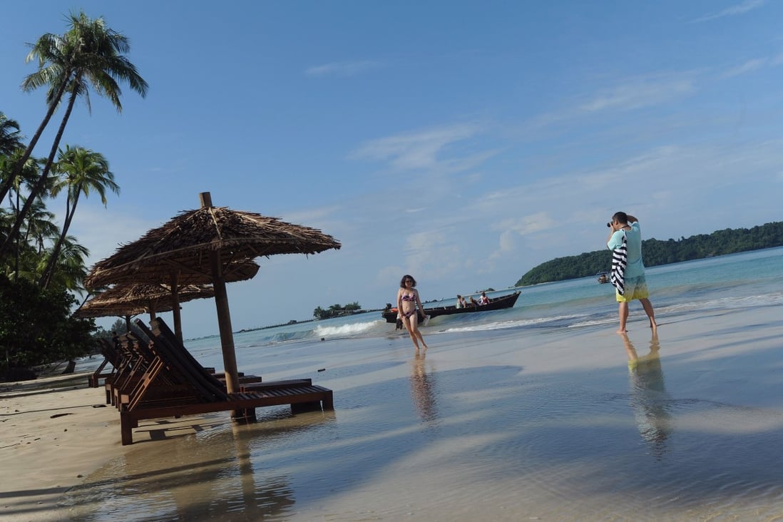 Tourists on the beach in Ngapali, the country's remote major resort near Thandwe, in Myanmar's western Rakhine state. Photo: AFP